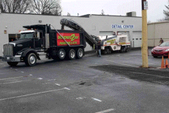Asphalt milling in progress on commercial parking lot in Frederick, MD