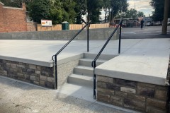 Concrete steps and railings on a sidewalk in Frederick, MD