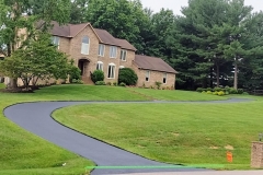 Residential driveway getting a fresh seal coating by Driveways 2Day Frederick, MD