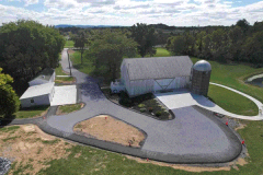 Smooth and patterned tar-and-chip driveway designed for durability in Frederick, MD
